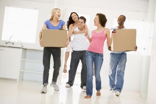 Packed household boxes and furniture ready for transport