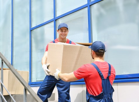Furniture being moved from a West Kensington apartment with tight stair access