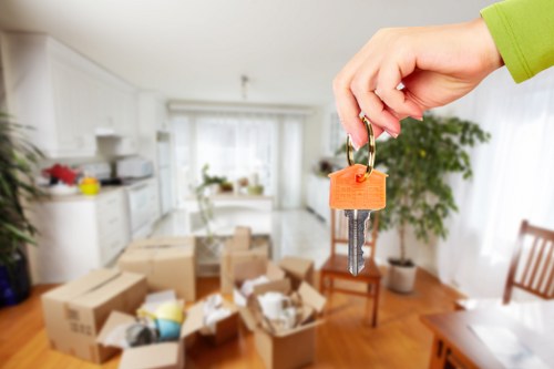 Movers handling a flat relocation with care in West Kensington