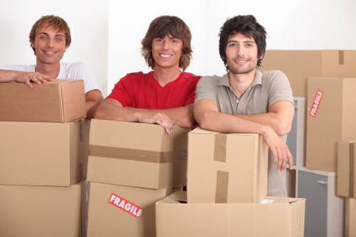 Assorted moving boxes and packing materials prepared for a West Kensington home move