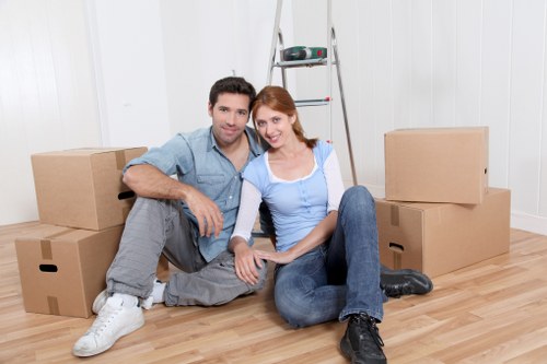 Professional home moving service supporting a family move in West Kensington