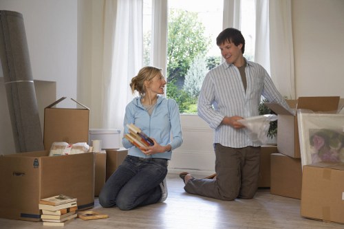 Careful loading of a sofa and cabinet for local furniture transport