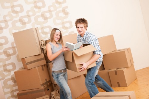 Packed boxes and labelled items ready for commercial removals