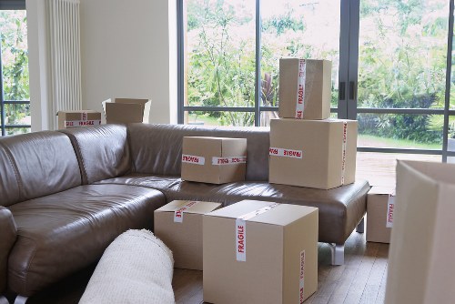 Office furniture and equipment prepared for a move in a West Kensington property