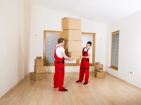 Piano moving through a West Kensington building with narrow access